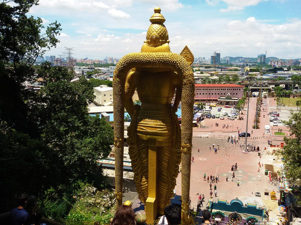 View from the Batu Caves over the Lord Murugan Statue all the way to Kuala Lumpur