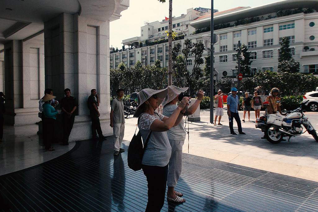 Tourists taking pictures at Ho Chi Minh City