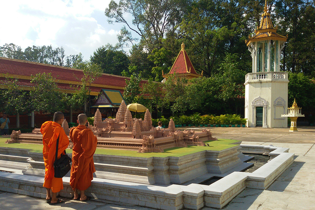 Two monks admiring the model of Angkor Wat at the Preah Vihear Preah Keo Morakot at Phnom Penh