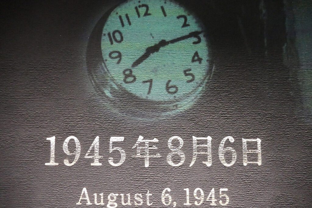 Clock showing the time the atomic bomb was dropped on Hiroshima, a city  risen up from the ashes; and a side trip to MIYAJIMA