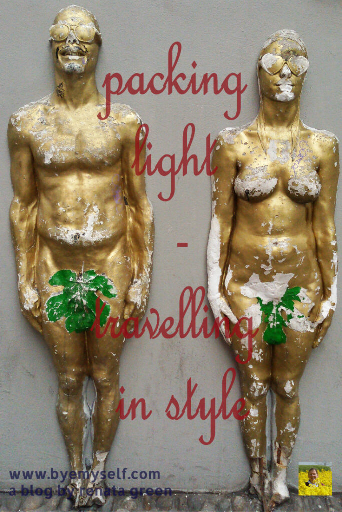 Pinnable Picture for the Post Packing Light - Travelling in Style showing two statues