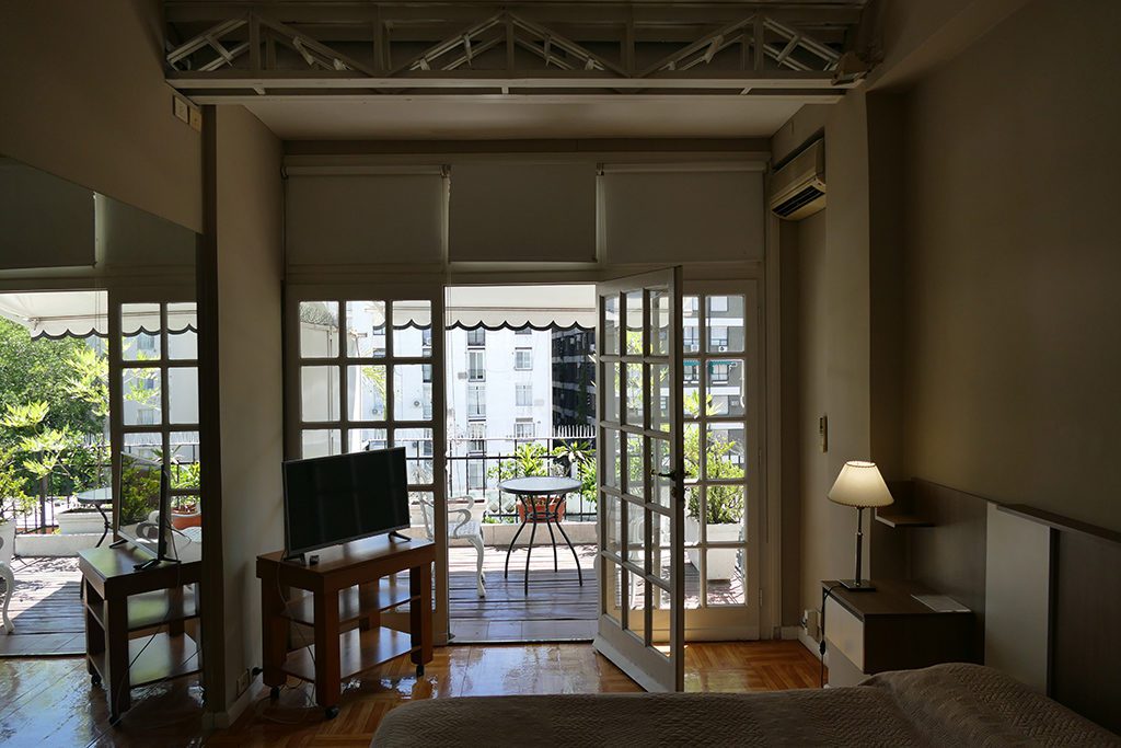 A cozy hotel room in the neighborhood of La Recoleta.