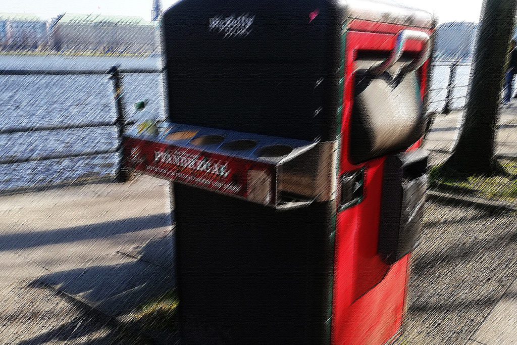 Modern trash bin with a tray for empty bottles, located in Hamburg. Something you need to know before going to GERMANY