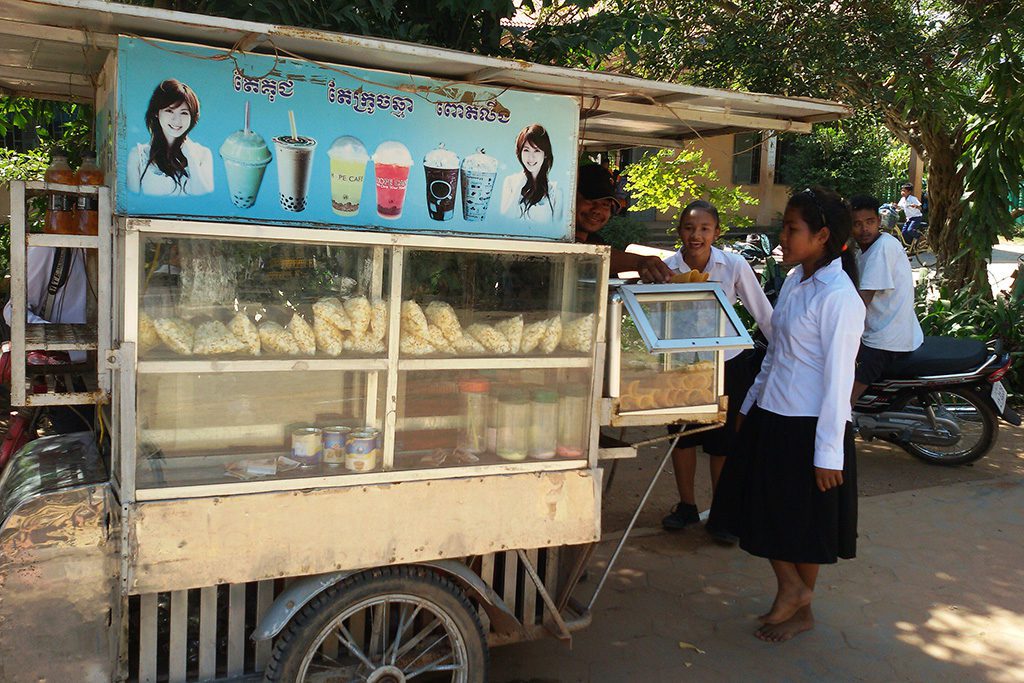 Students buying snacks in Siem Reap