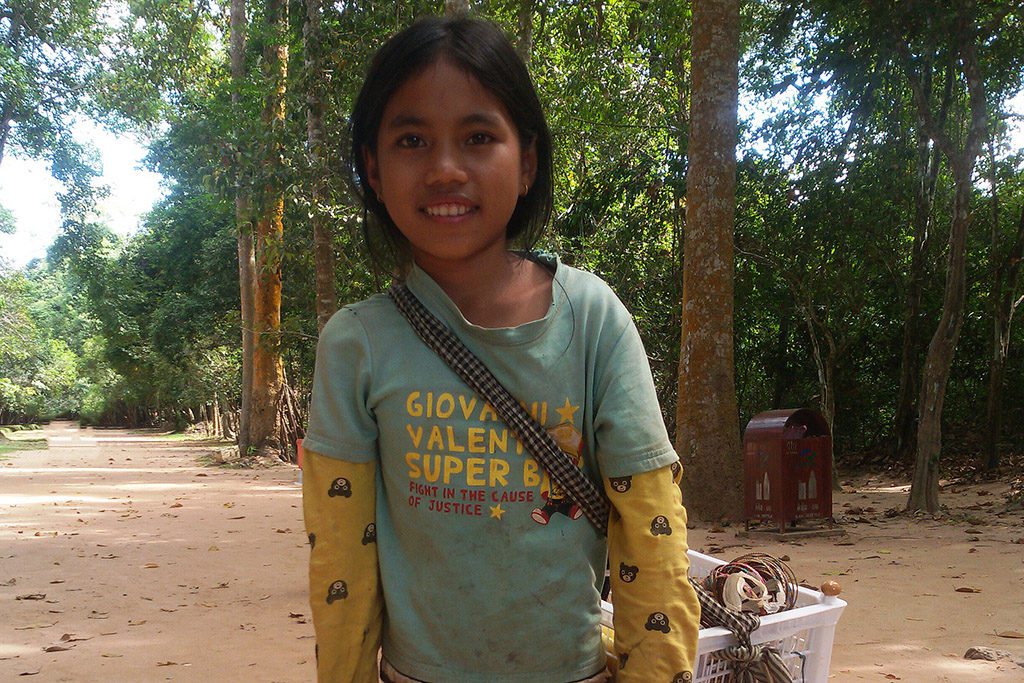 One of many little girls selling souvenirs at Preah Kahn 