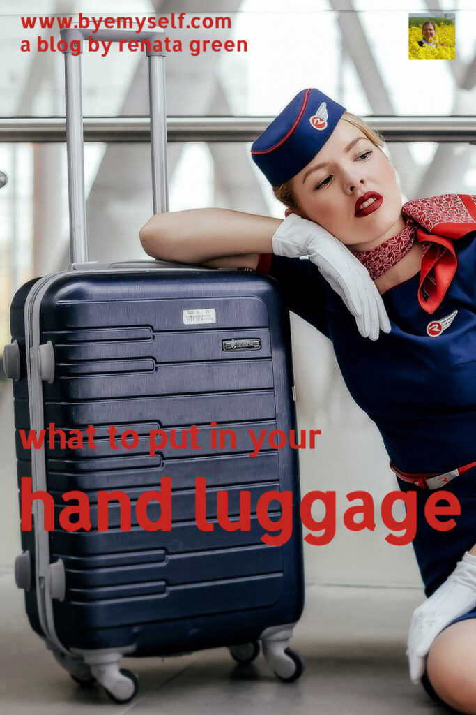 Pinnable Picture for the Post on What to Put in Your Hand Luggage