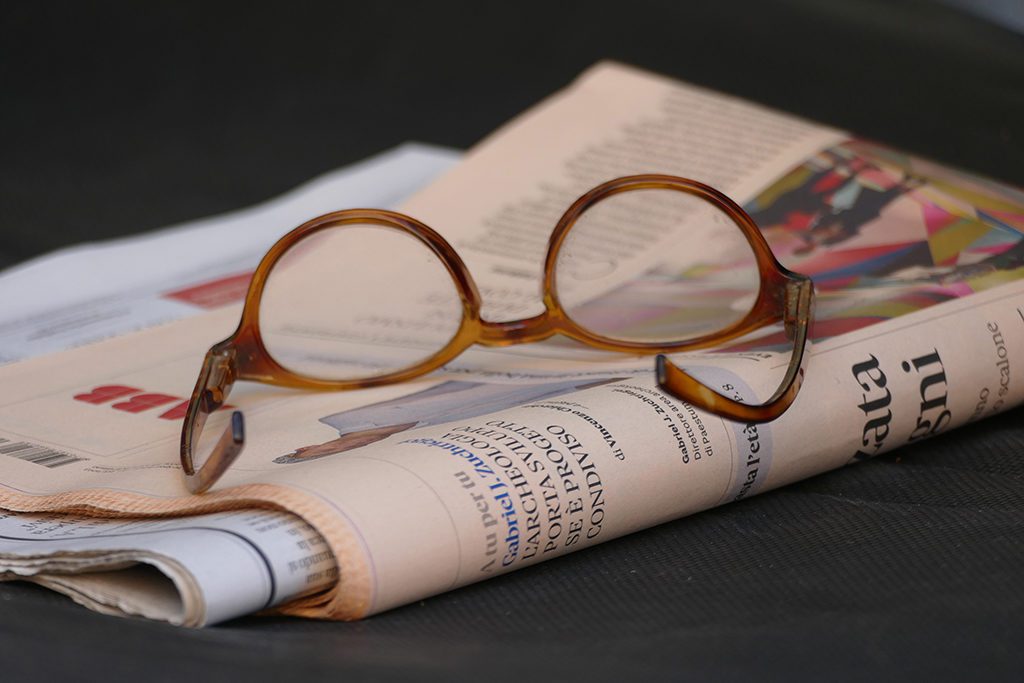 Reading Glasses and an Italian Newspaper