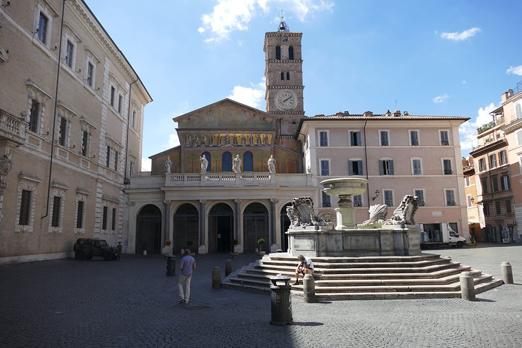 The Piazza, Basilica, and Fontana di Santa Maria in Trastevere form the quarter's core.