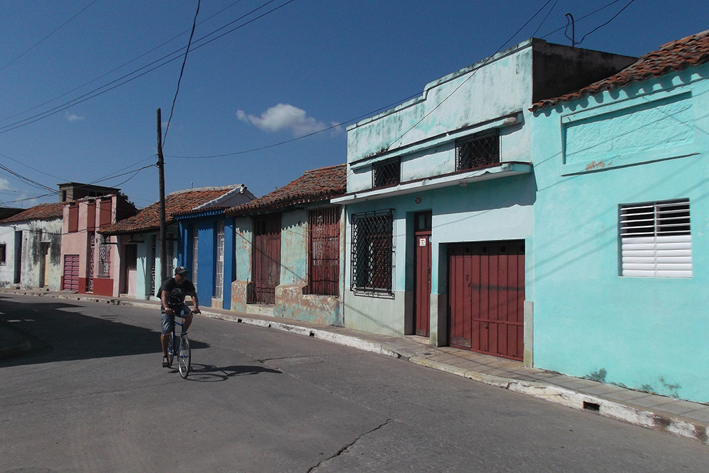 Man Exploring Camagüey on a bike