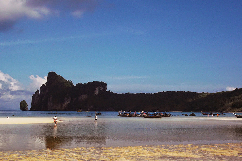 People walking on a beach on Koh Phi Phi in the Andaman Sea