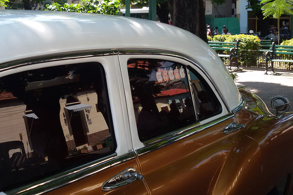 Car parked at Plaza de Dolores in Santiago de Cuba