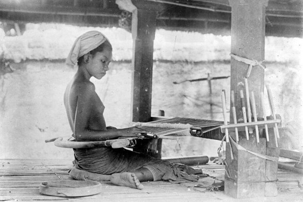 Young woman waving on Bali