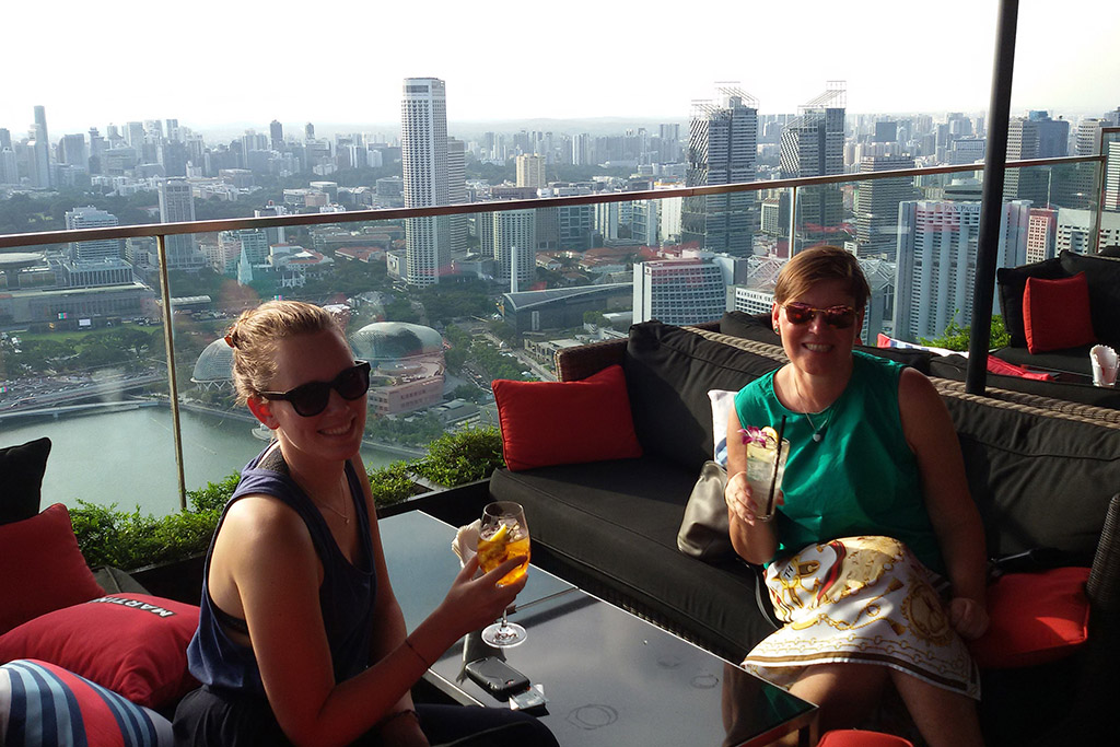 Renata Green enjoying a cocktail at the  CÉ LA VI  Bar at the Marina Bay Sands Hotel. 