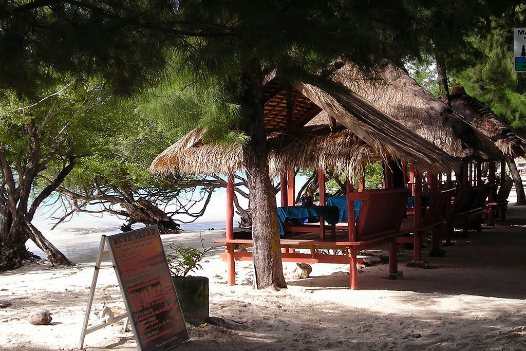 Pavilions at a beach restaurant on Gili Meno