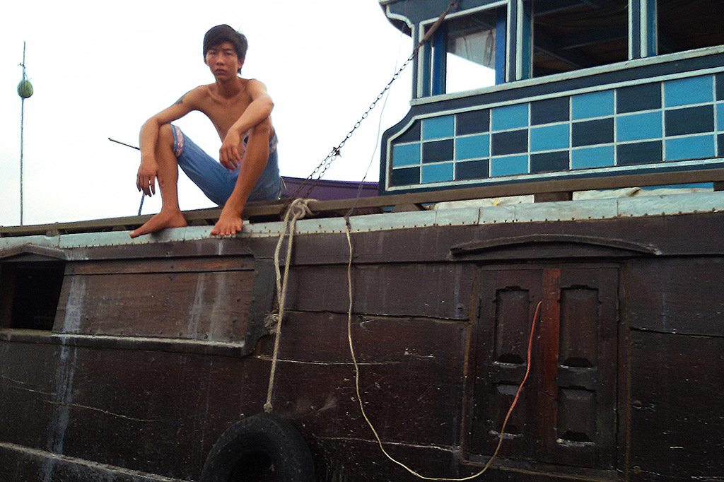 Vendor on the floating market of Cai Rang