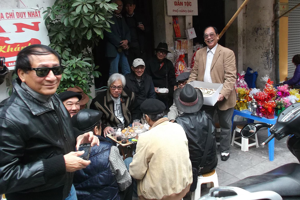 Men playing games on the streets of Hanoi