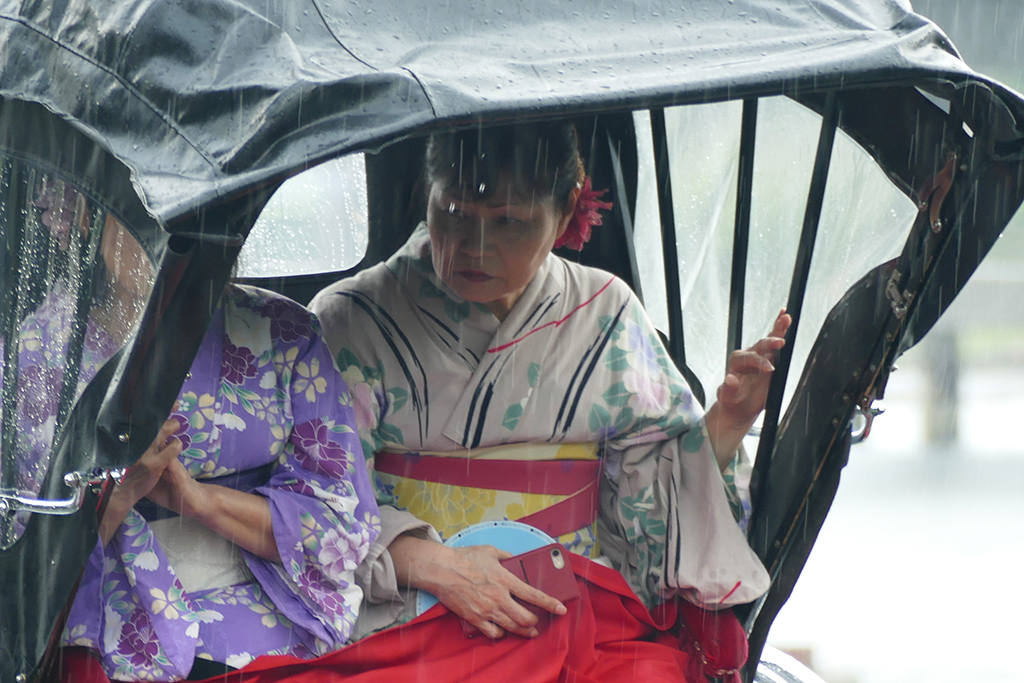 Two Geishas in a Ryksha at Arashiyama, to be visited on 4 Days Kyoto Treasure Box of Japan