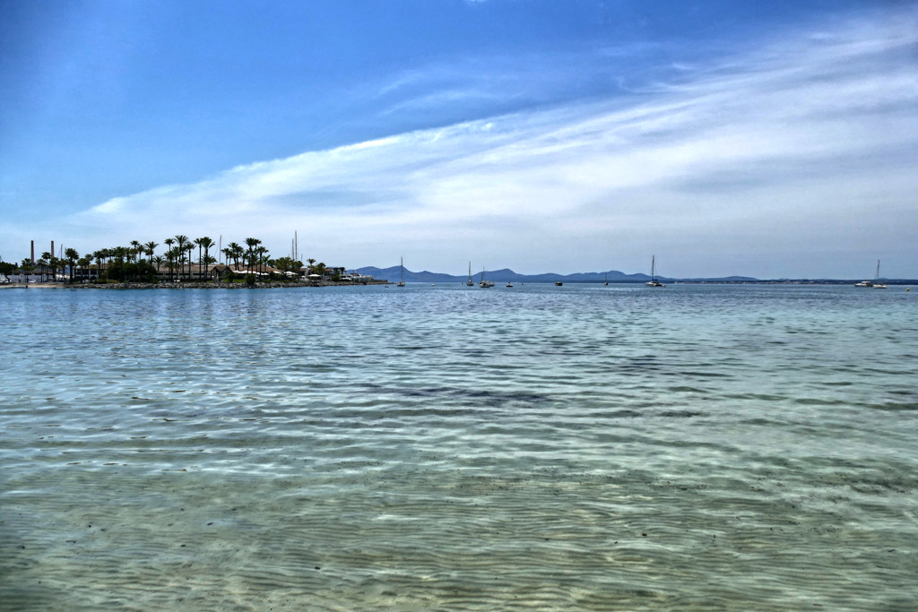 Cristal clear waters at the beach of Alcúdia.