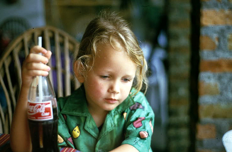 Mimi Green enjoying a bottle of Coca Cola
