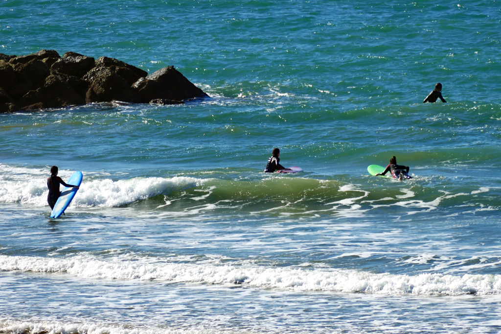 Surfers in Cadiz - the oldest city of Europe.