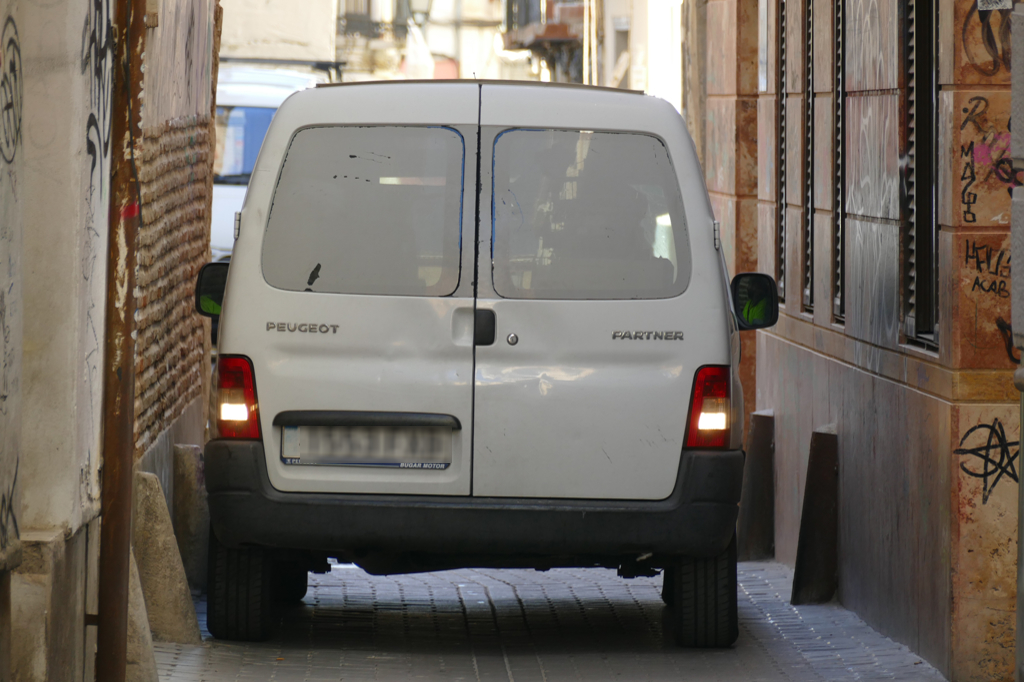 Car stuck in a street in Spain.