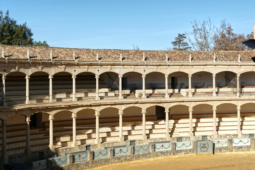 Bullring of the Royal Cavalry of Ronda, a white germ in the skies