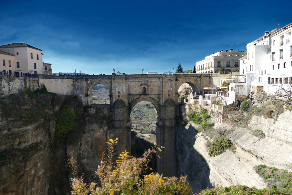 Puente Nuevo in Ronda, a white germ in the skies