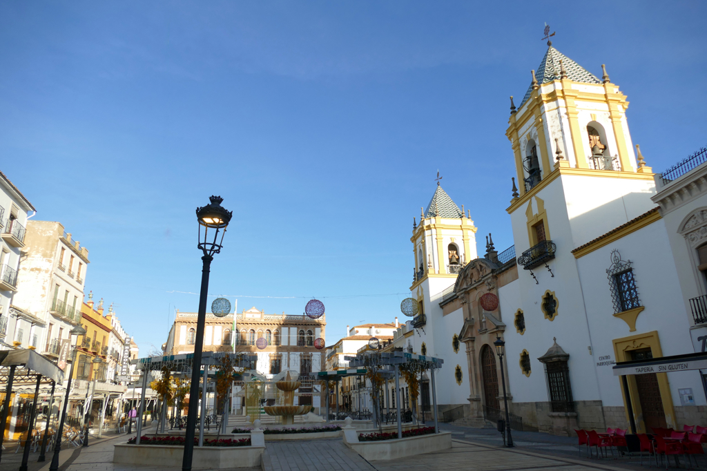 Plaza del Socorro with the Parroquia de Nuestra Señora del Socorro on the right side. Straight ahead is Ronda's casino.