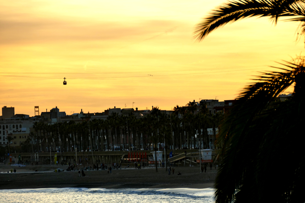 The Port Cable Car sliding between the Platja de Sant Sebastià and Montjuïc.