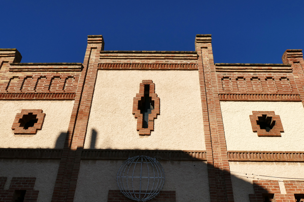 The geometrically decorated facade of the culture centre Sant Lluís.