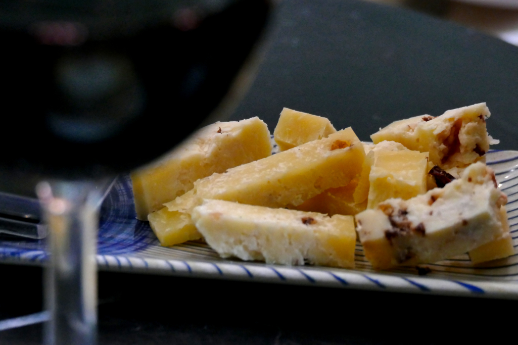 Local cheese with a glass of vino tinto, red wine.