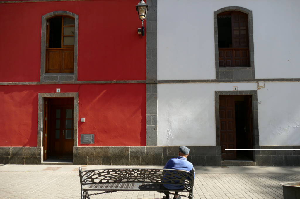 Man sitting on a bench in Teror