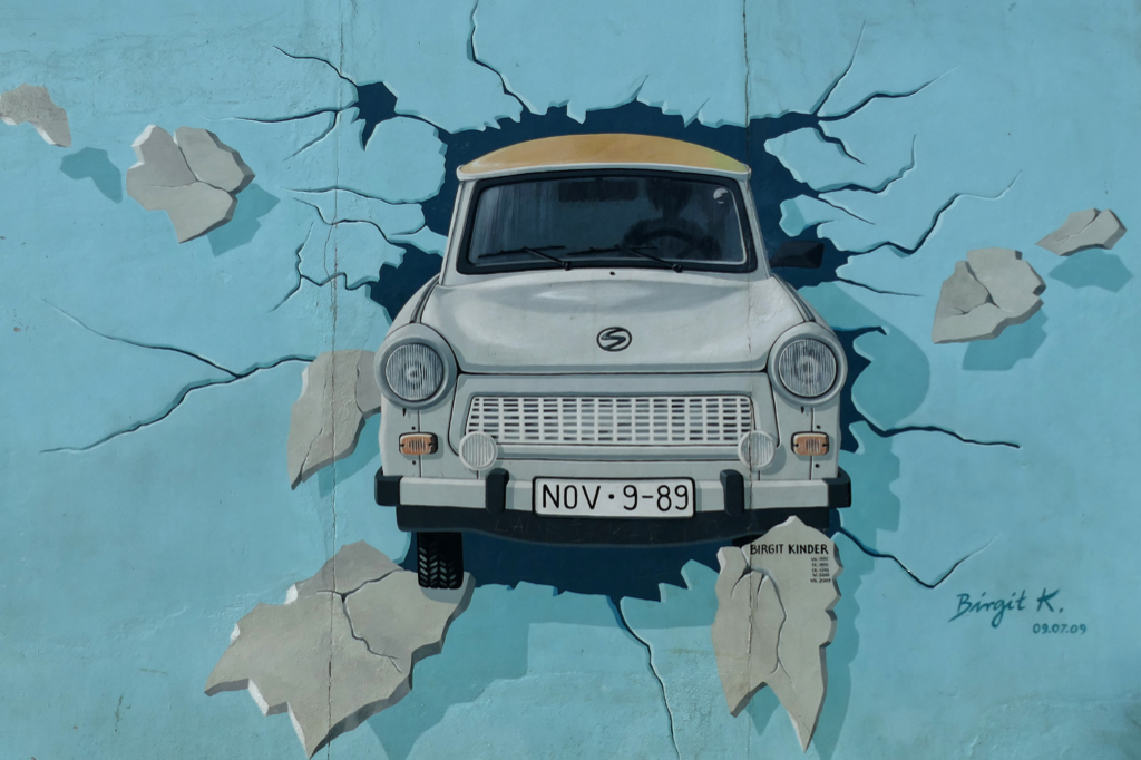 Mural at the East Side Gallery in Berlin introduced in a Guide to the city's Wild East