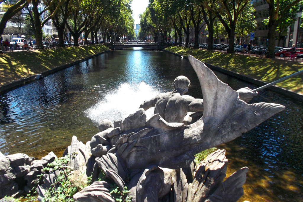 The Greek god Triton at the northern end of the city moat. The sculpture was made in 1902 by Friedrich Coubillier.