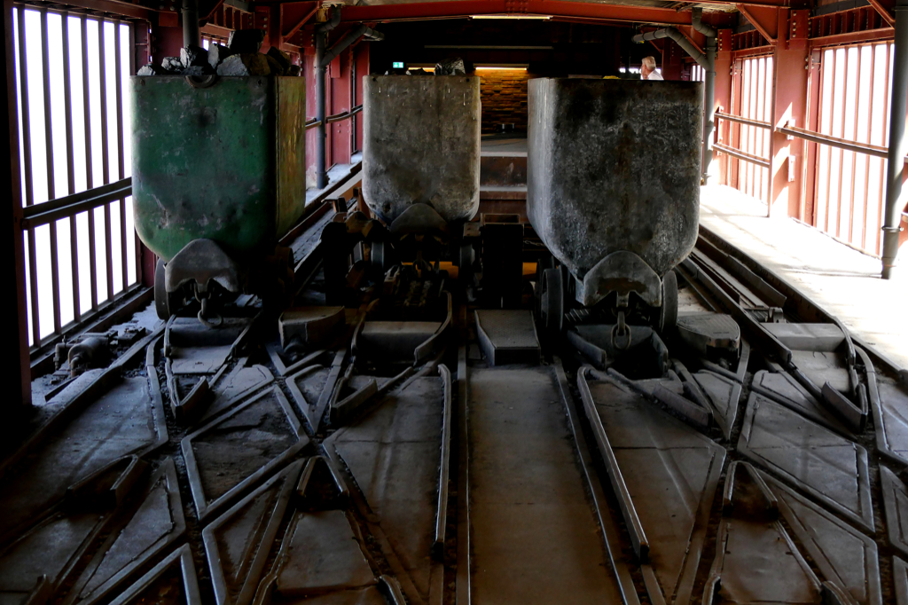 Old mining cars at the former coal mine Zeche Zollverein in Essen.