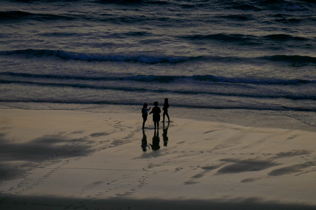 People on the beach of Corralejo.