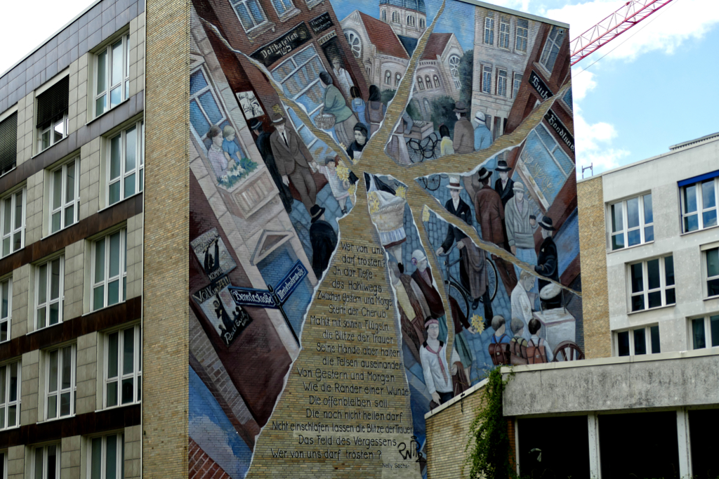 The traditional Jewish life at the Grindelviertel shatters in Cecilia Herrero-Laffin's larger-than-life mural.