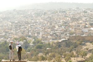 Two guys enjoying the panoramic view of Fez.