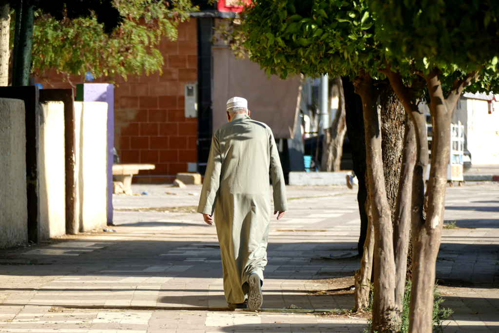 Man walking the streets of Meknes.