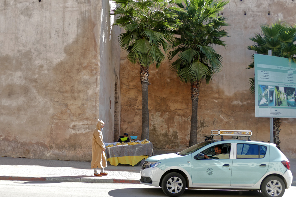 Man waiting for a cab in Meknes.