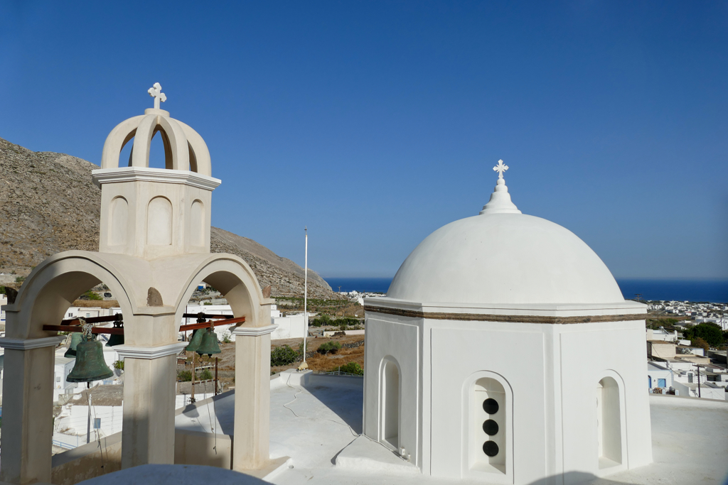 Looking all the way to Perissa over the domes of the Holy Orthodox Church of Saint Spyridon.