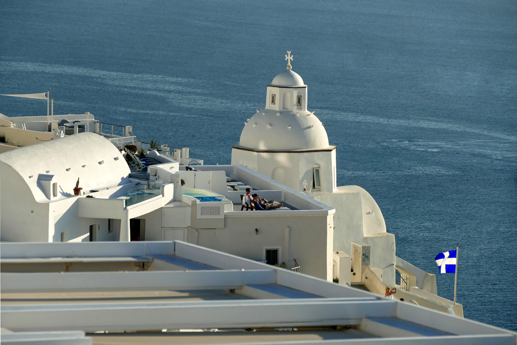 Fira in Santorini with the Agiou Mina church in the backdrop.