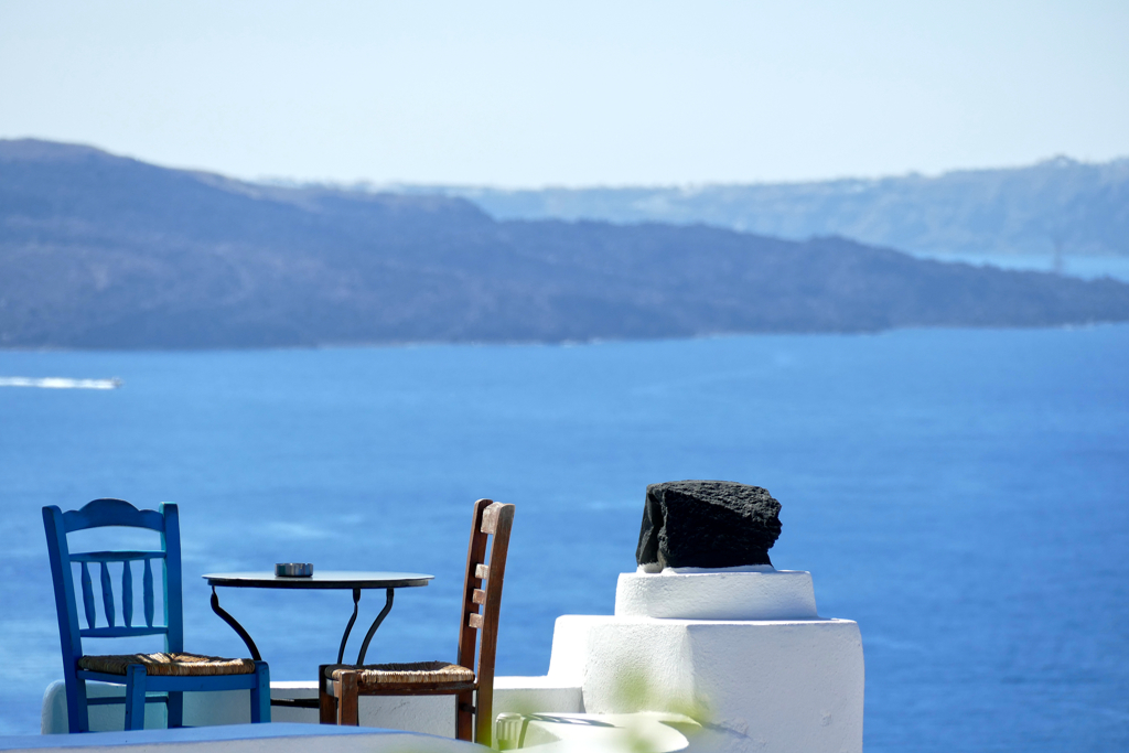 Chairs in Oia, seen on a self-guided tour by public bus during three days on Santorini