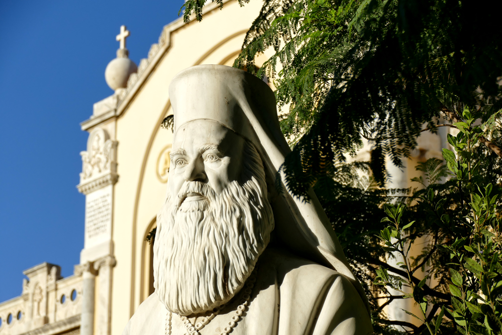 Statue of a Patriarch in front of the Minas Cathedral in Heraklion.