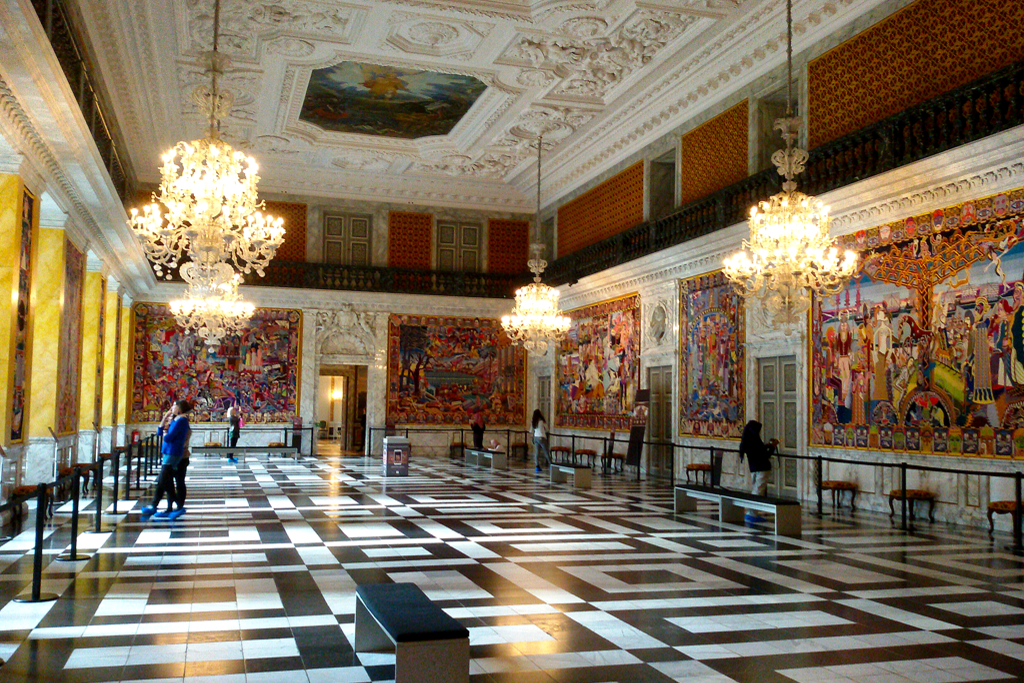 The grand hall at Christiansborg Castle with the remarkable tapestries by Bjørn Nørgaard.