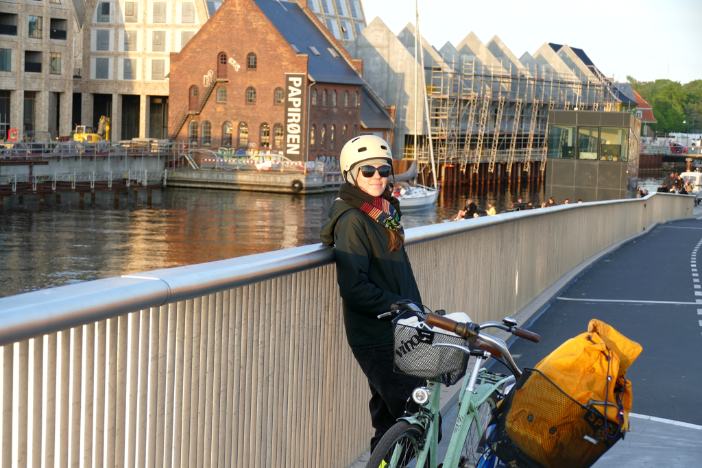 Young woman on a bridge in Copenhagen.