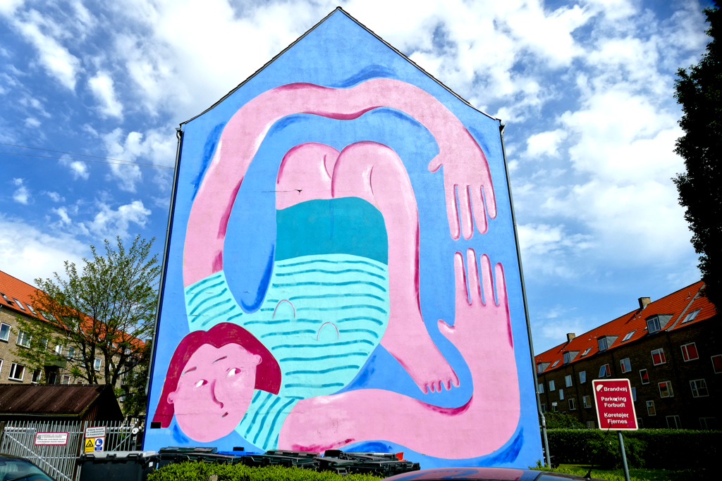 Coline Marotta at Open Air Gavl Galleri where you find some of the best street art in Copenhagen