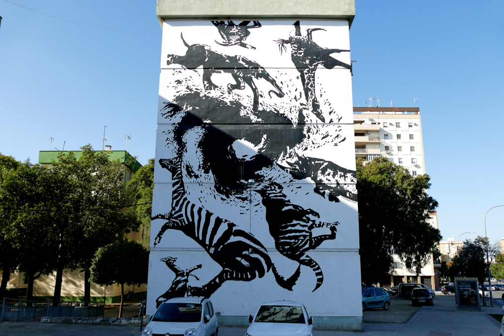 Mural by Victor Ash - best street art in Seville in the district of San Pablo