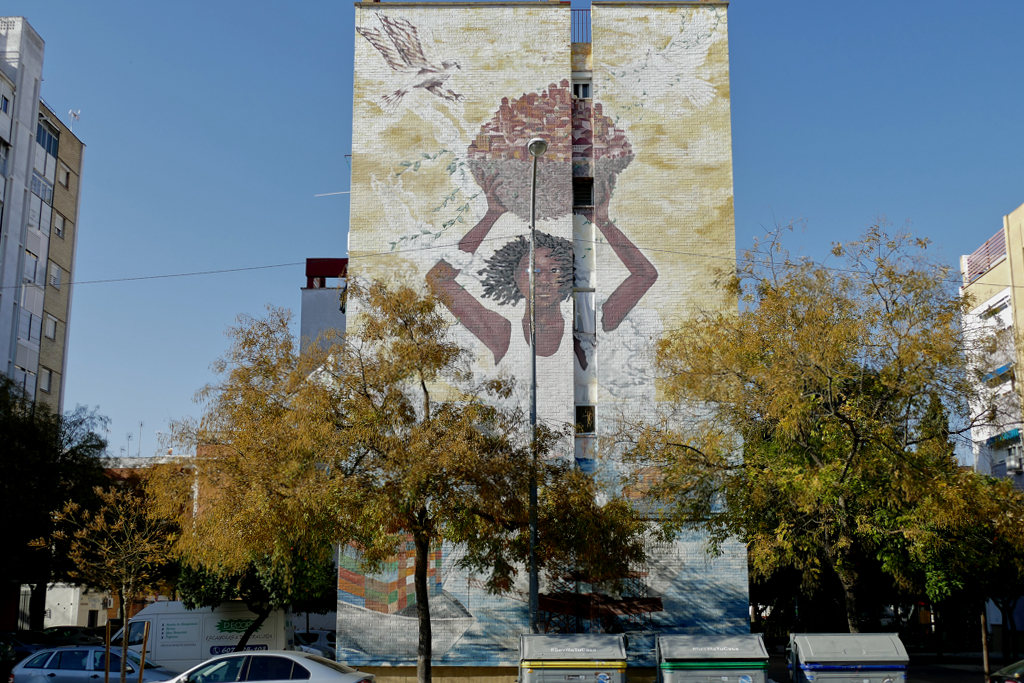 Mural by Katie Yamasaki - best street art in Seville in the district of San Pablo