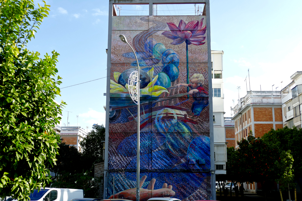 Mural by Josh Sarantitis, some of the best street art in the San Pablo district of Seville.